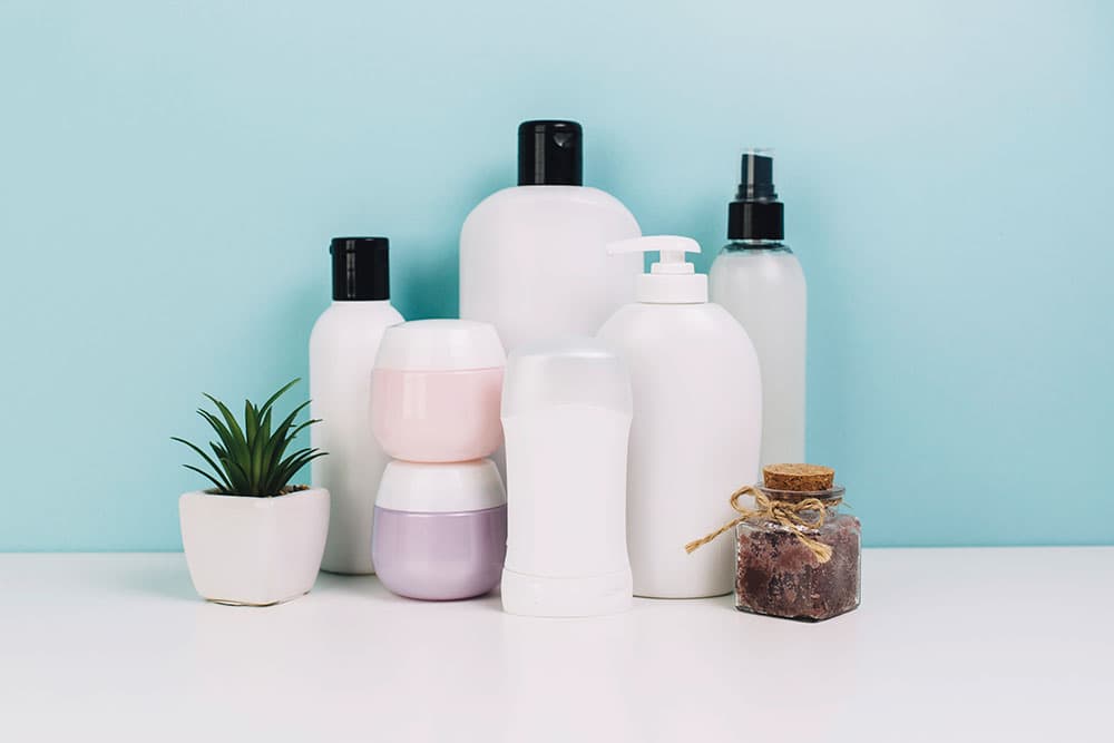 cosmetics-jars-bottles-near-plant